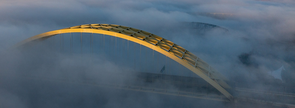 Aerial drone photo of Cincinnati bridge in the fog